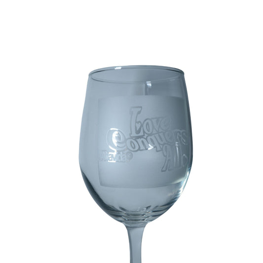 Love Conquers All Wine Glass